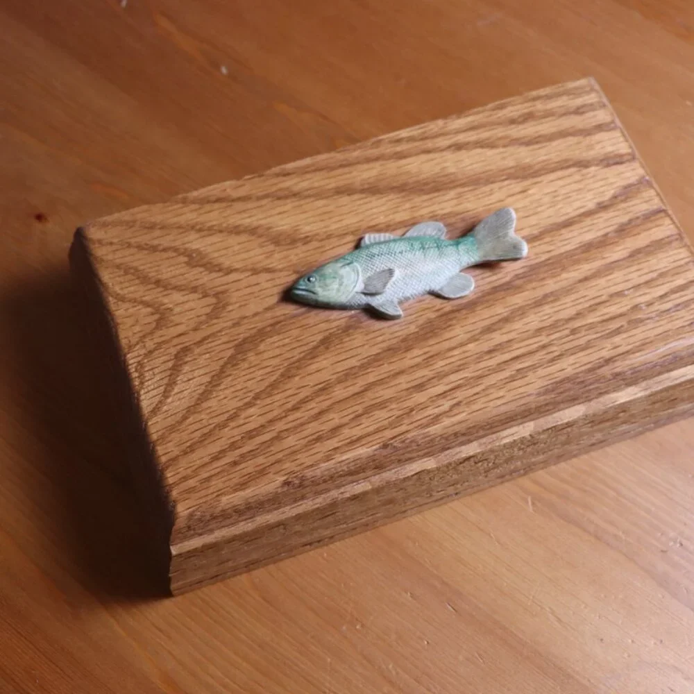Wooden box for desk with letter opener, small carved fish on top, lid opens,
